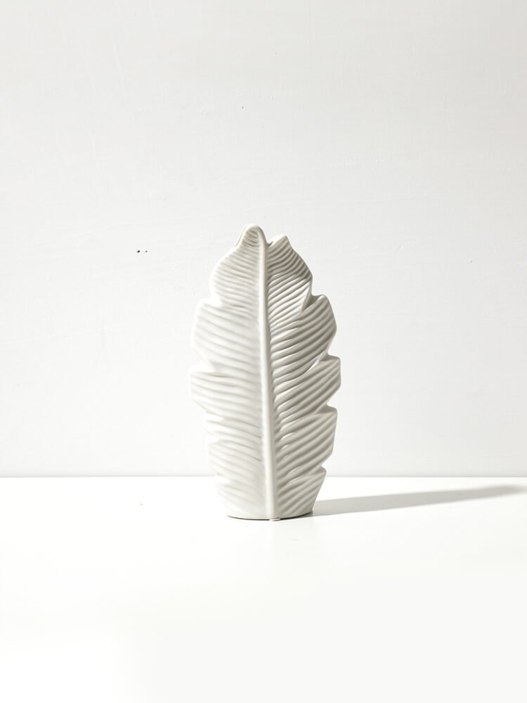 Minimalist Nordic style vase with subtle leaf motif