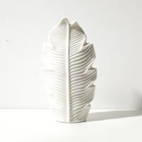 Minimalist Nordic style vase with subtle leaf motif