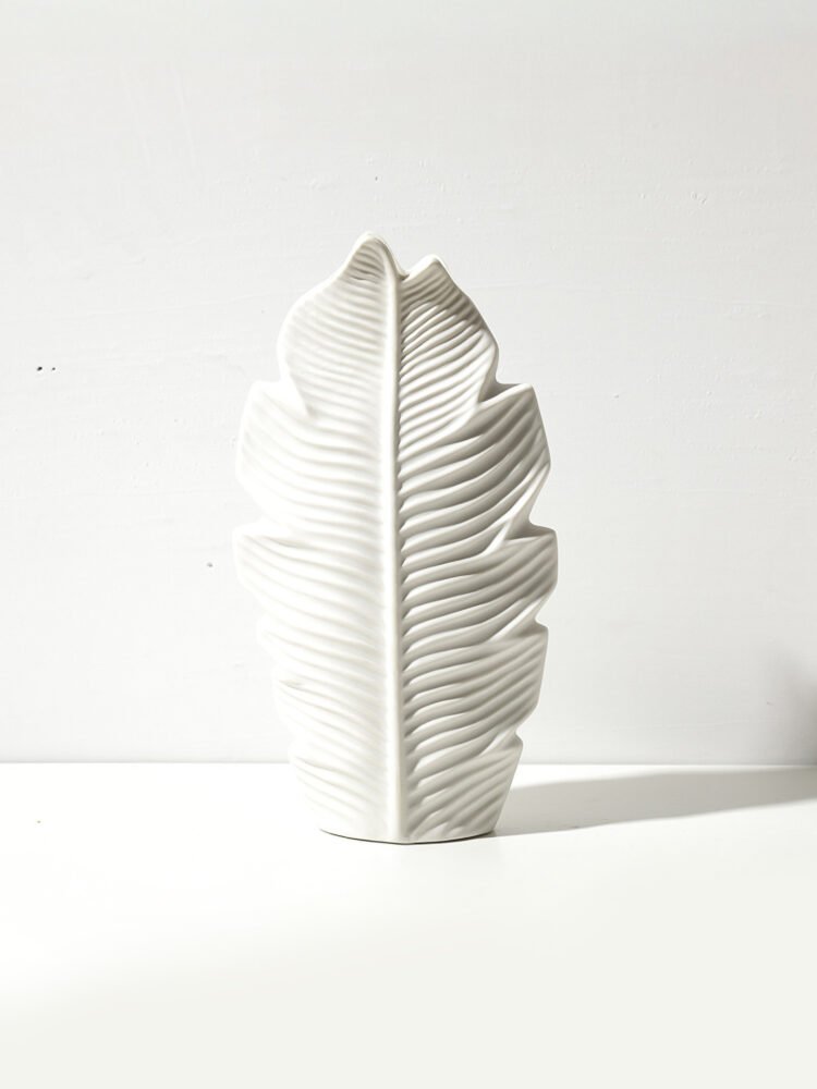 Minimalist Nordic style vase with subtle leaf motif