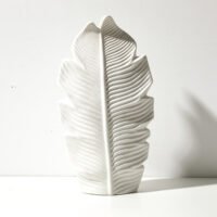 Minimalist Nordic style vase with subtle leaf motif