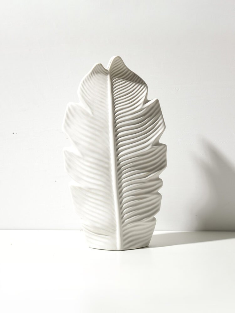 Minimalist Nordic style vase with subtle leaf motif
