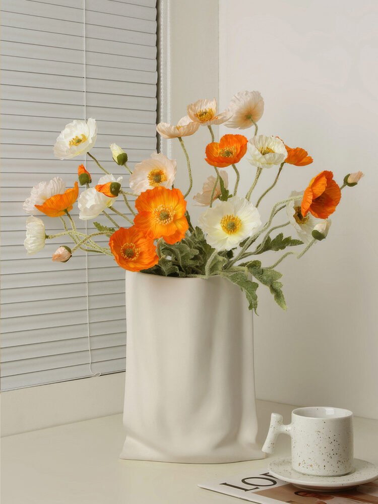 Hand-pinched aesthetic ceramic vase resembling a paper bag