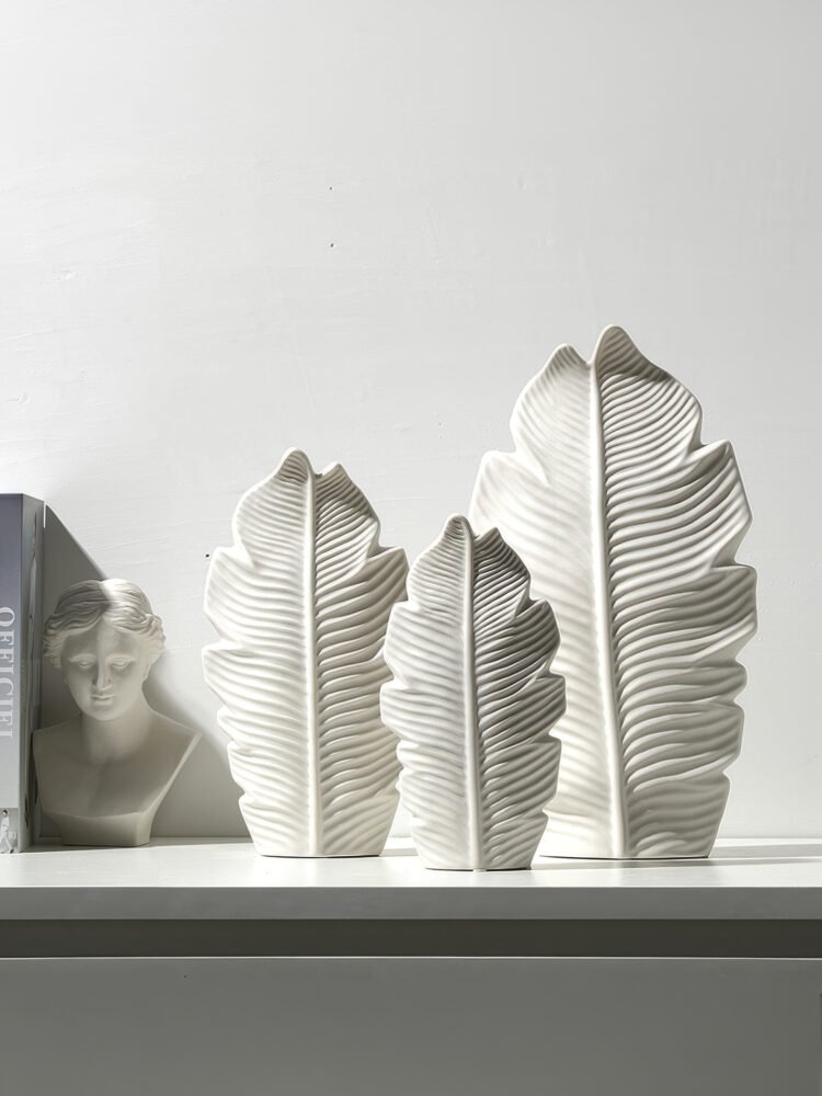 Minimalist Nordic style vase with subtle leaf motif