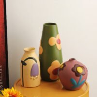 Hand-painted rustic pottery floral motif vase