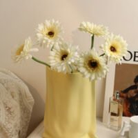 Hand-pinched aesthetic ceramic vase resembling a paper bag