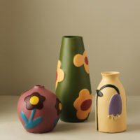 Hand-painted rustic pottery floral motif vase