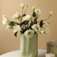 Hand-pinched aesthetic ceramic vase resembling a paper bag