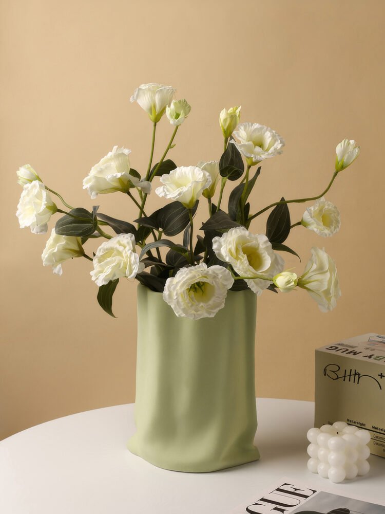 Hand-pinched aesthetic ceramic vase resembling a paper bag