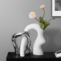 Irregularly shaped color-blocked vase