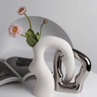 Irregularly shaped color-blocked vase