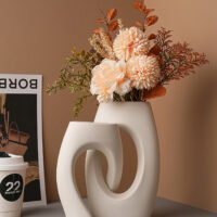 Alien cross tube flower vase