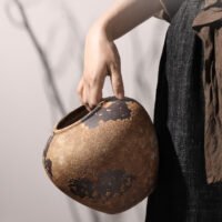 Weathered wabi-sabi vintage style pottery vase