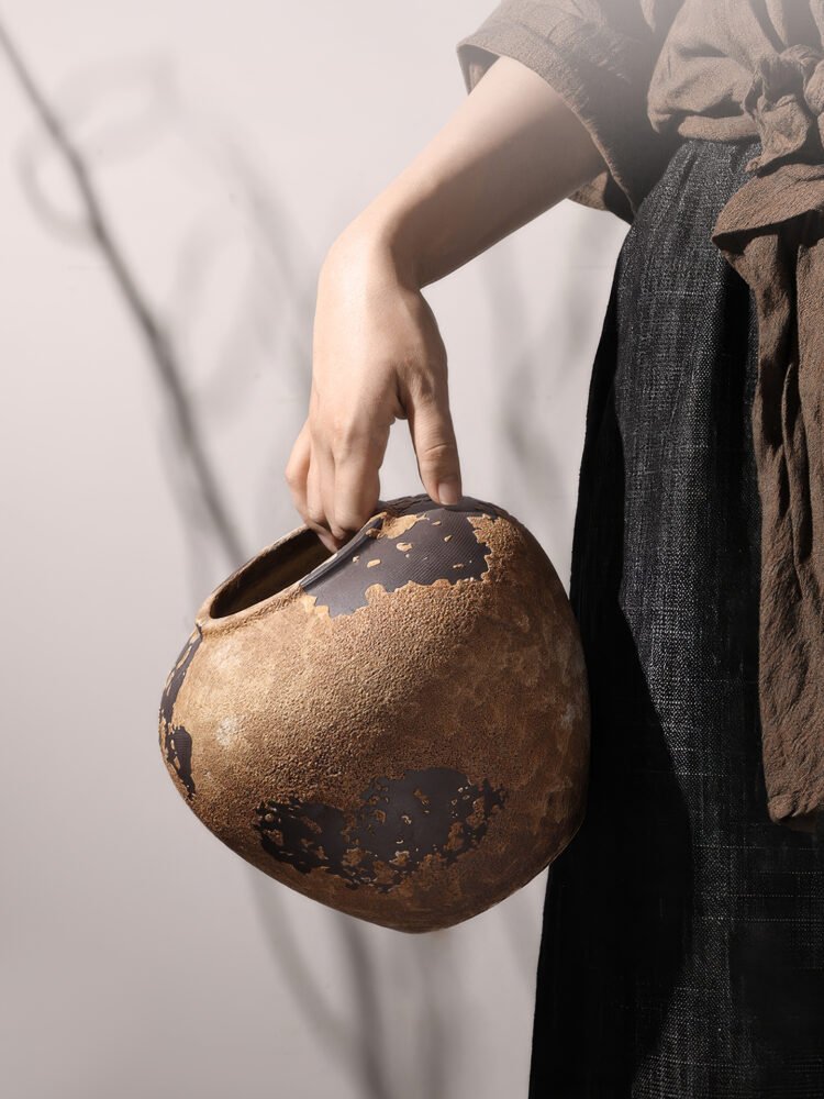 Weathered wabi-sabi vintage style pottery vase