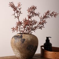Weathered wabi-sabi vintage style pottery vase