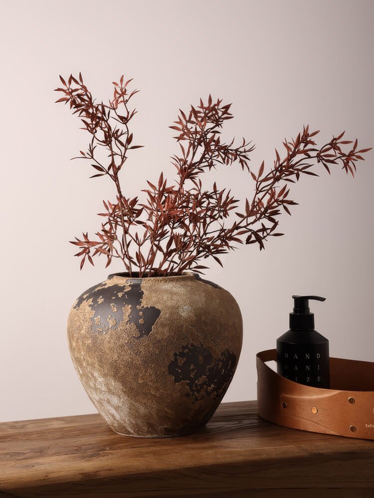 Weathered wabi-sabi vintage style pottery vase