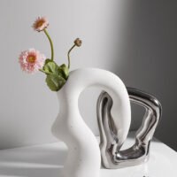 Irregularly shaped color-blocked vase