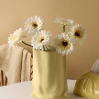 Hand-pinched textured paper bag vase