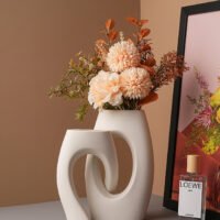 Alien cross tube flower vase