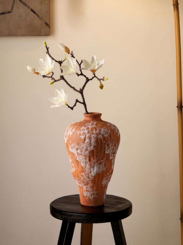 Vibrant orange irregular shaped modern ceramic vase