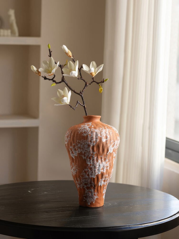 Vibrant orange irregular shaped modern ceramic vase