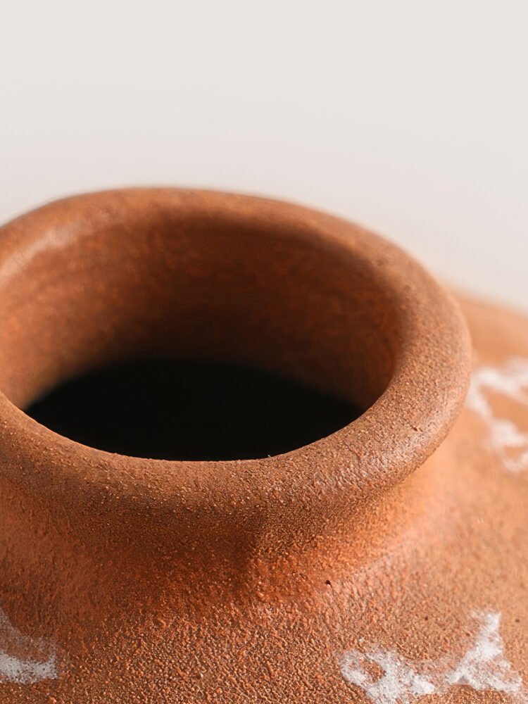 Vibrant orange irregular shaped modern ceramic vase