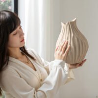 Wabi-sabi minimalist vase with irregular surface pattern