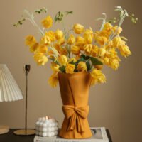 Elegant bow-shaped white ceramic vase for bouquets