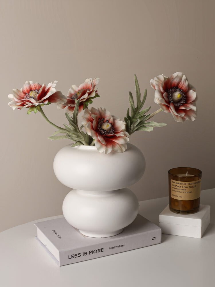 Minimalist hollow donut-shaped ceramic vase