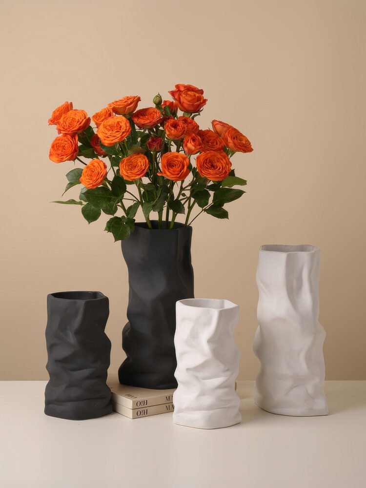 Creative ceramic vase mimicking crinkled kraft paper bag texture