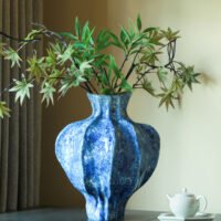 Wabi-sabi style pleated texture white ceramic vase