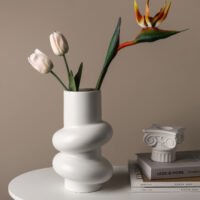 Minimalist hollow donut-shaped ceramic vase