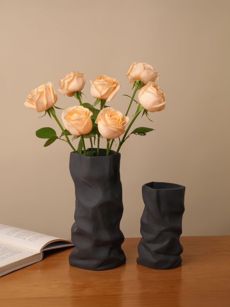 Creative ceramic vase mimicking crinkled kraft paper bag texture