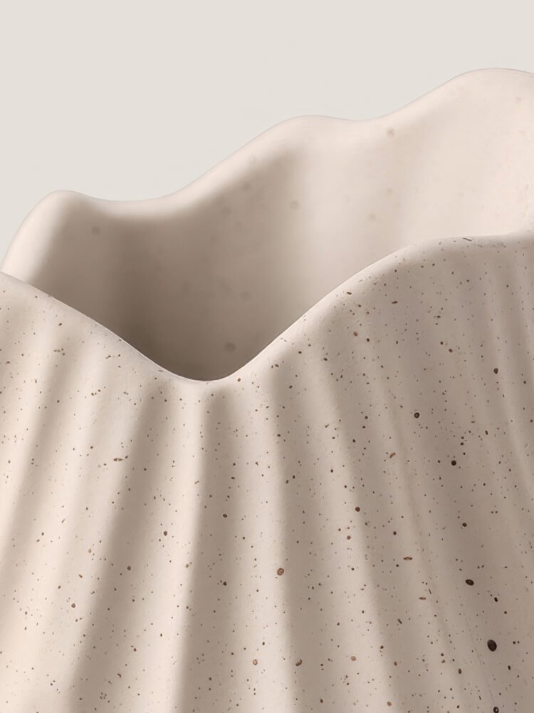 Wabi-sabi minimalist vase with irregular surface pattern