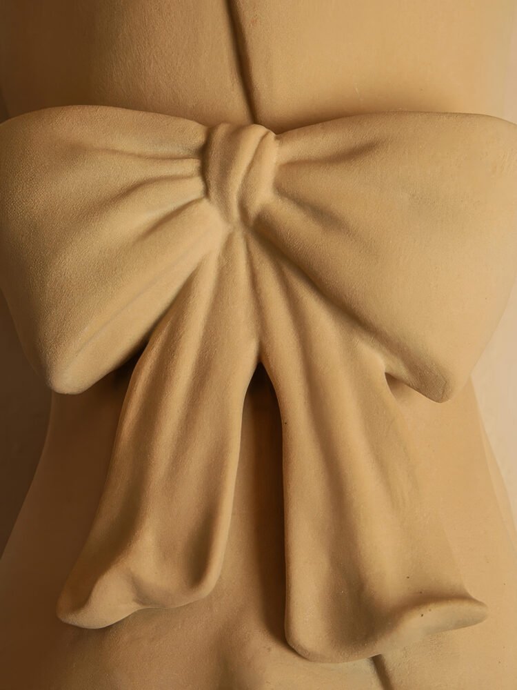 Elegant bow-shaped white ceramic vase for bouquets