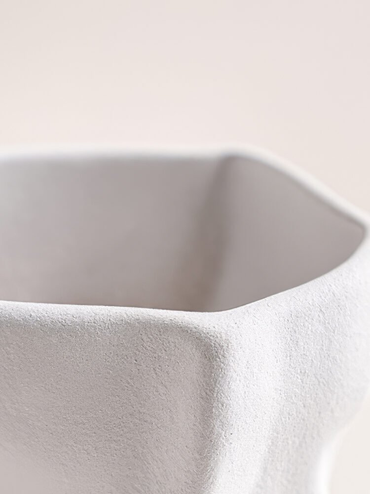 Creative ceramic vase mimicking crinkled kraft paper bag texture