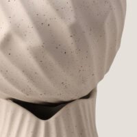 Wabi-sabi minimalist vase with irregular surface pattern