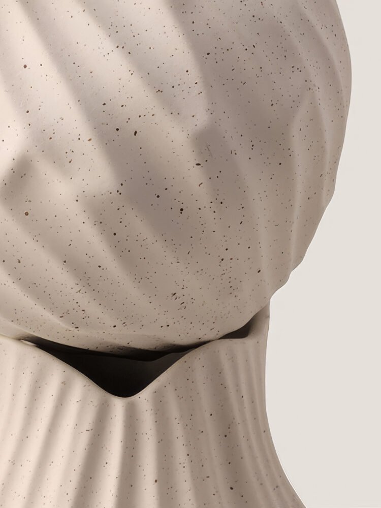 Wabi-sabi minimalist vase with irregular surface pattern