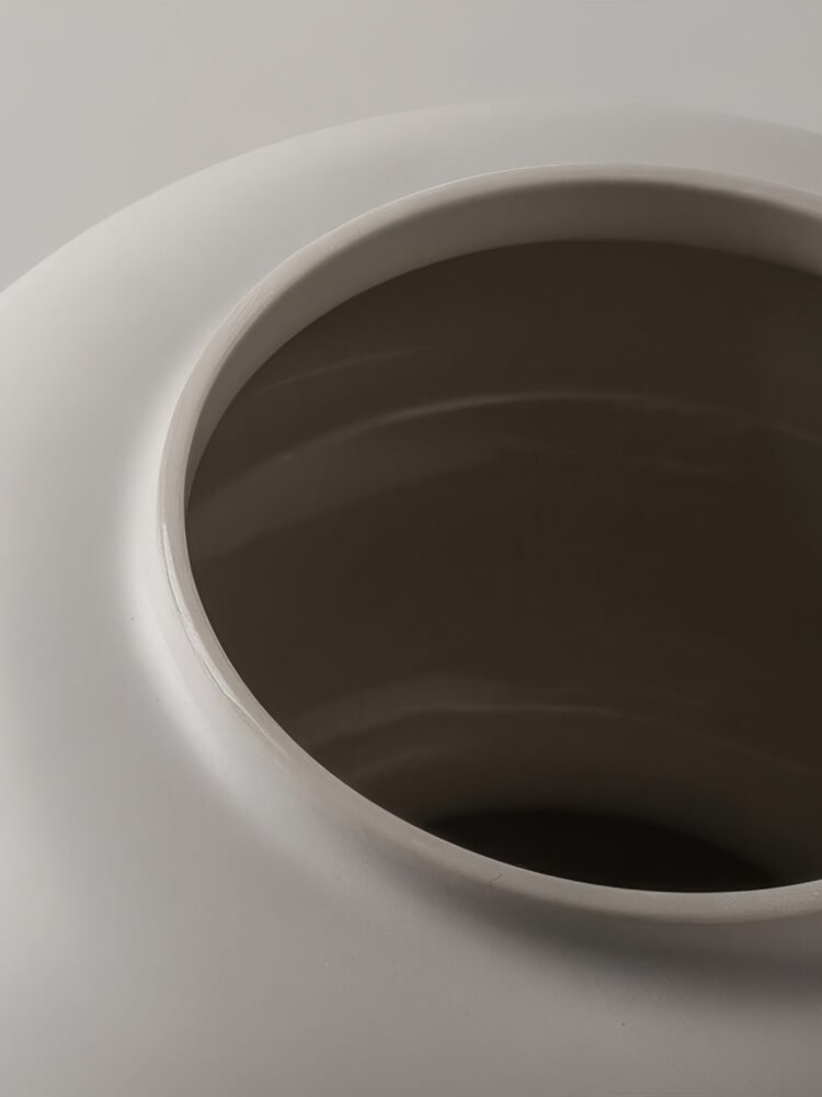 Minimalist hollow donut-shaped ceramic vase