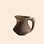 Wabiv dry-glazed earthy ceramic flower vessel with textured natural finish