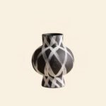 Wabiv modern ink-patterned striped ceramic vase in minimalist studio setting