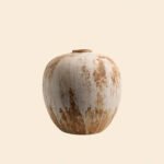 Wabiv rustic unadorned ceramic vessel with weathered traces for wabi-sabi home decor