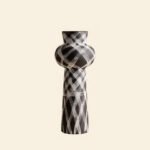 Wabiv modern ink-patterned striped ceramic vase in minimalist studio setting