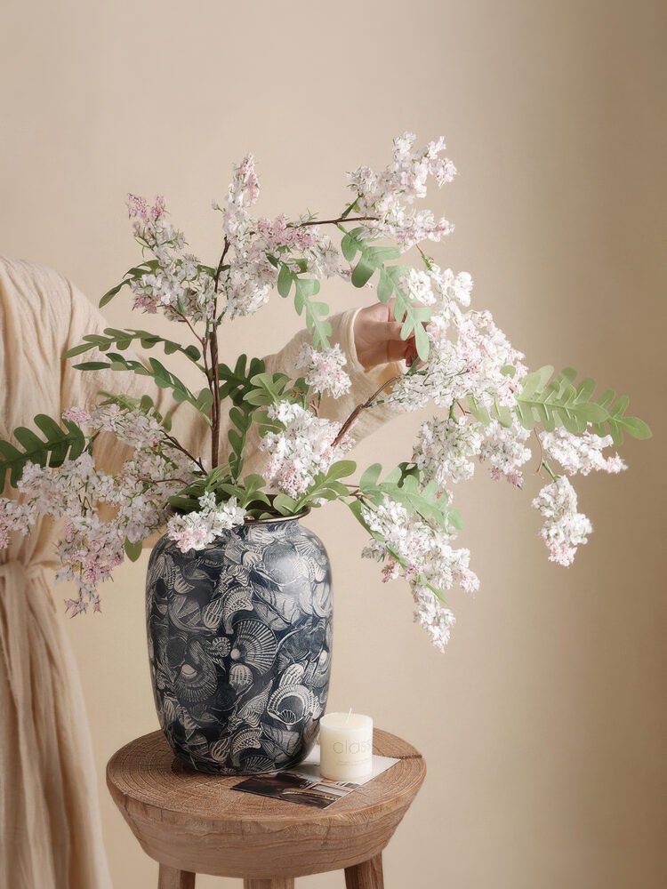 Wabiv aesthetic shell-patterned ceramic vessel for minimalist neutral home styling
