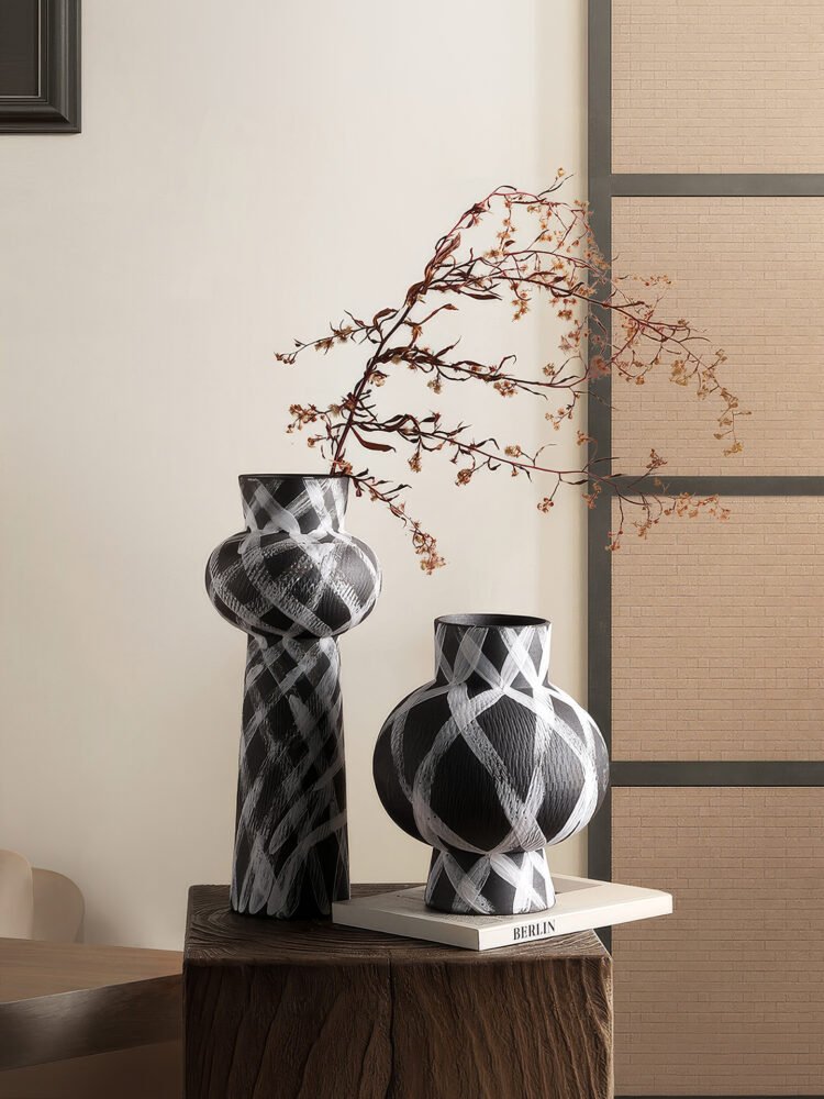 Wabiv modern ink-patterned striped ceramic vase in minimalist studio setting