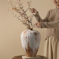 Wabiv rustic unadorned ceramic vessel with weathered traces for wabi-sabi home decor