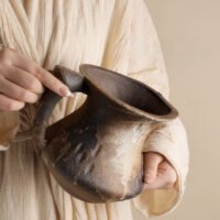 Wabiv dry-glazed earthy ceramic flower vessel with textured natural finish