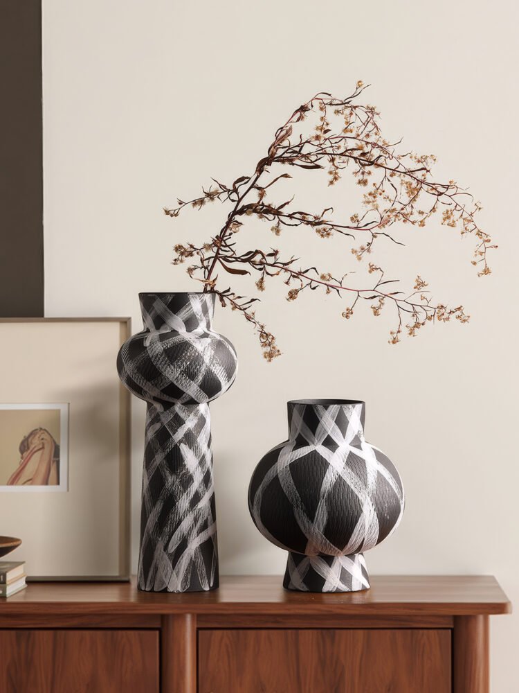 Wabiv modern ink-patterned striped ceramic vase in minimalist studio setting