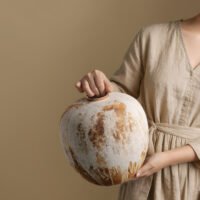 Wabiv rustic unadorned ceramic vessel with weathered traces for wabi-sabi home decor