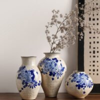 Classic blue-and-white porcelain vessel with delicate wisteria floral motif