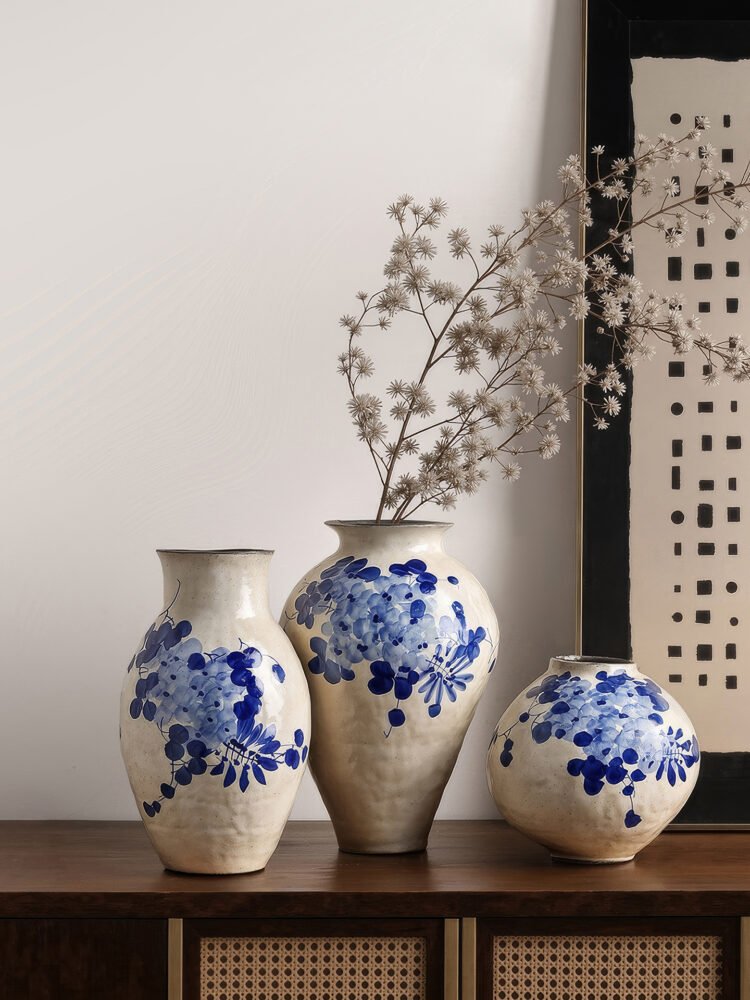 Classic blue-and-white porcelain vessel with delicate wisteria floral motif